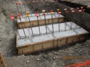 Concrete pour for sculpture foundation