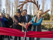 Ribbon cutting ceremony Willene Jaqua-McRae, John Mauro, and Mayor Deborah Stinson