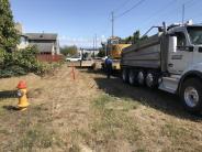 Contractors staging equipment for the project
