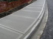New sidewalk, looking west up Jefferson Street