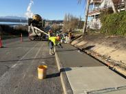 Sidewalk installation on Walker Street, completion