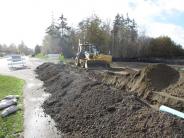 Crews prepare for sewer main & side sewer install.