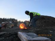 Crews continue installing the Joint Utility Trench down Howard St.