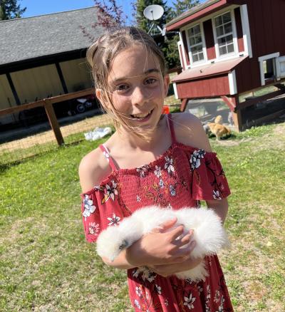 ella with chickens